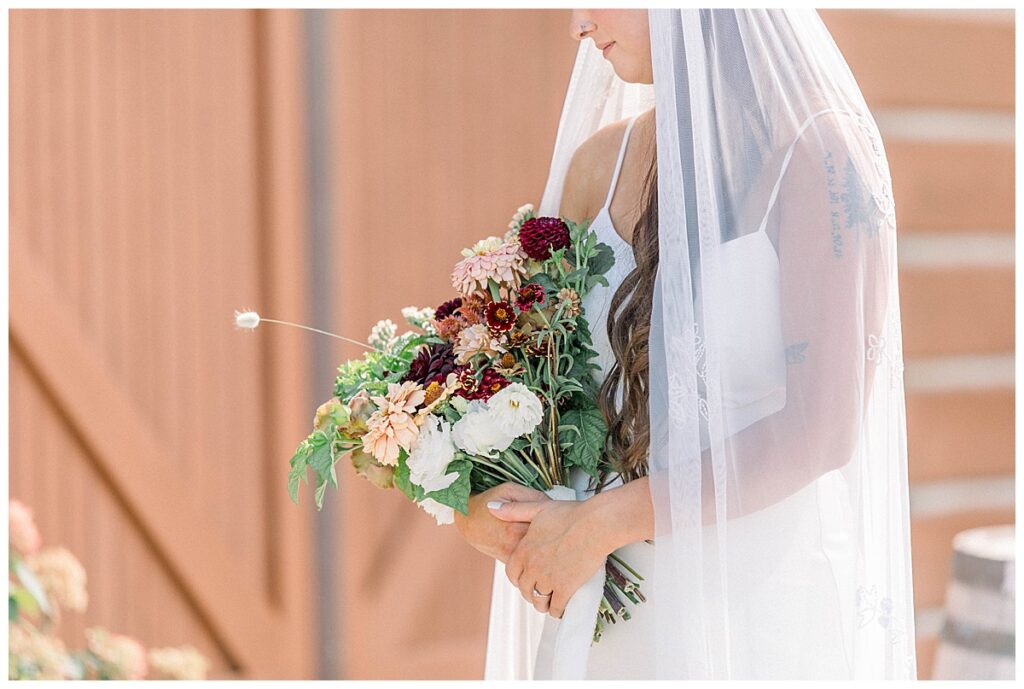 floral bridal portraits at the hart ranch. white and pink bridal bouquet and bride.
