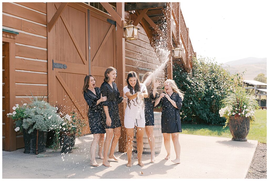 bridesmaids portraits at the hart ranch in Bozeman montana. champagne pop bridesmaids photos.