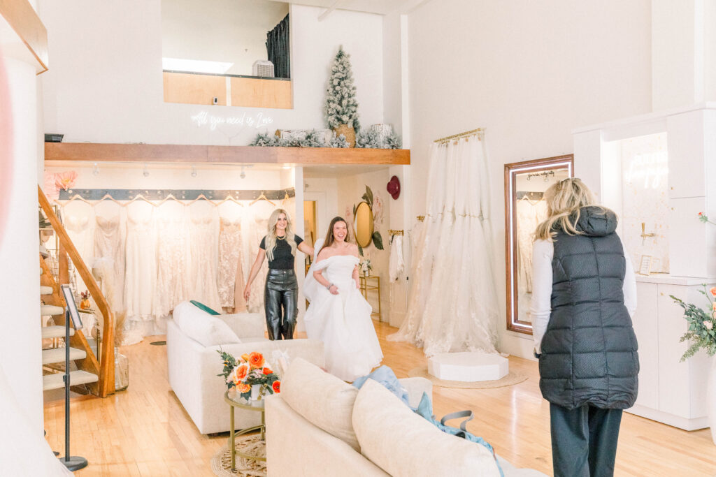 Bride trying on dress at belle en blanc in Billings Montana.