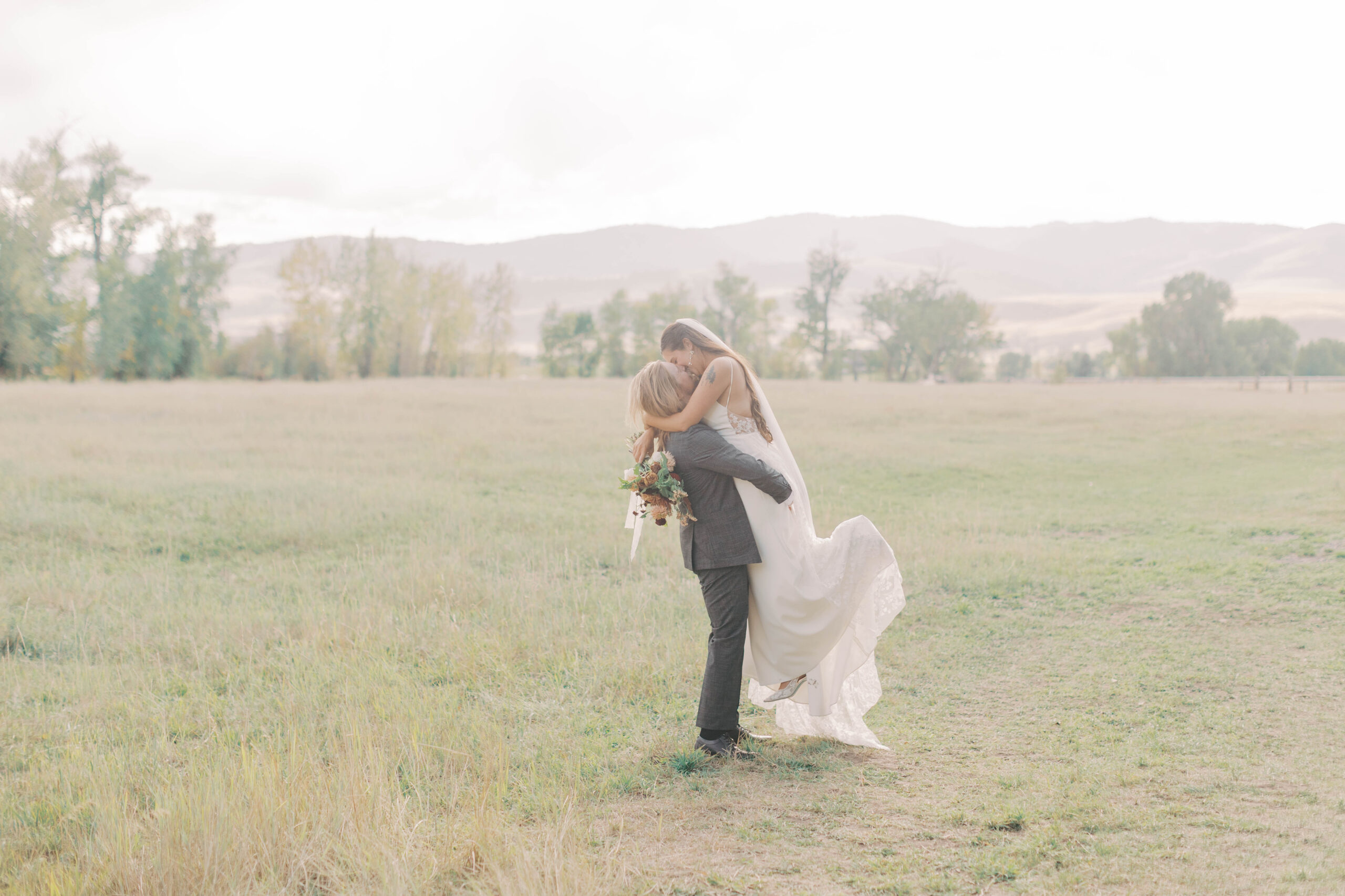bride and groom wedding photography in Bozeman montana at the hart ranch wedding venue.