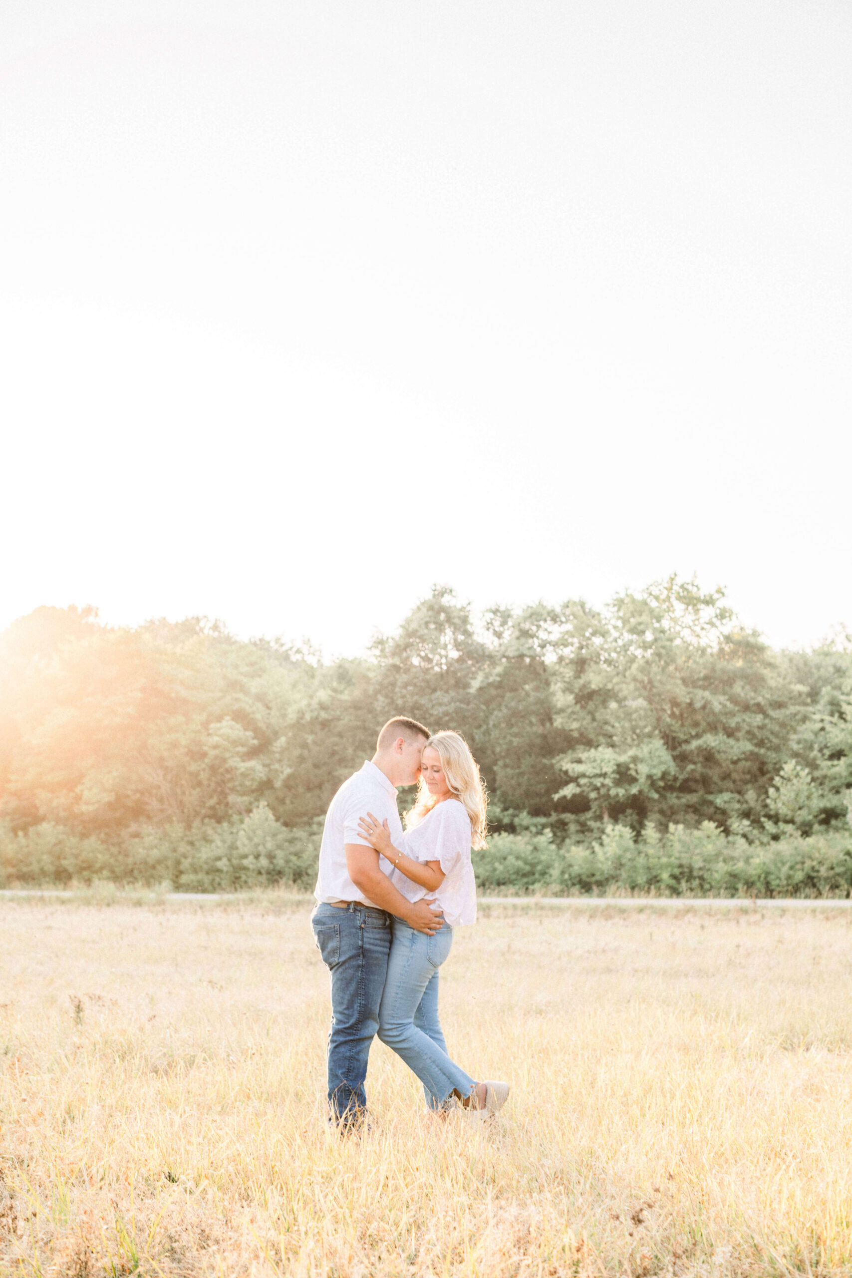 Engagement photographs taken in a wheat field in Montana.