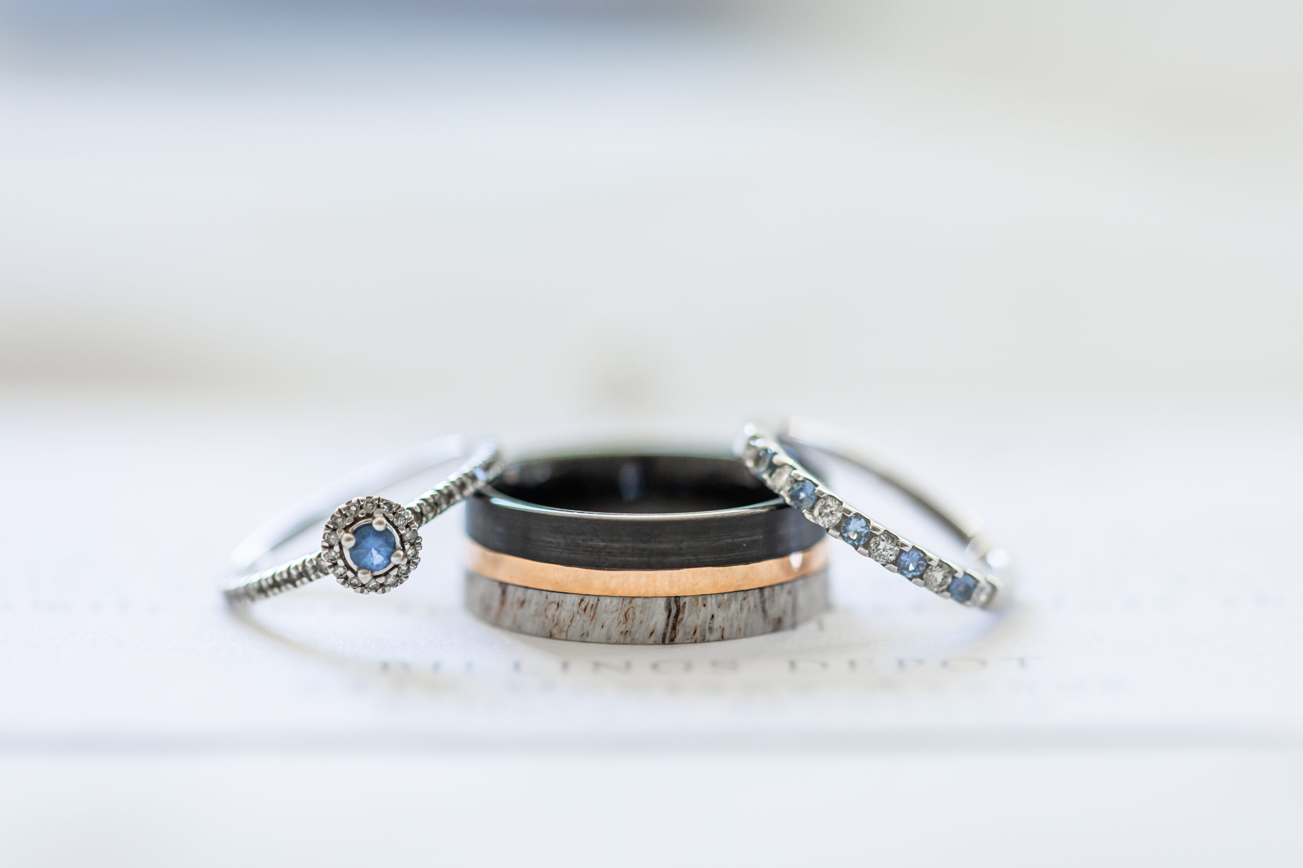 Photo of Yogo sapphire wedding ring and band.
